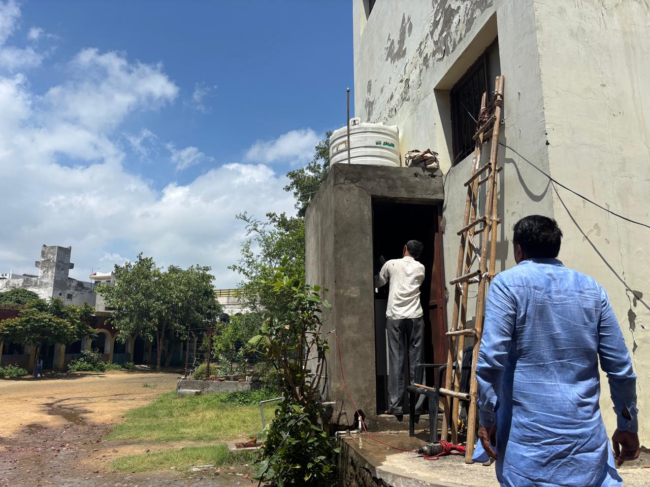 A Matri Seva Trust site visit, assessing space and access for an RO installation